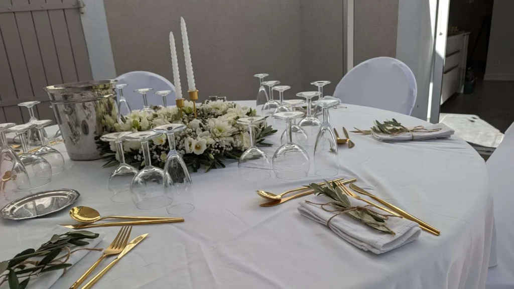 Chic white and gold themed wedding with flower crown, furniture and tableware